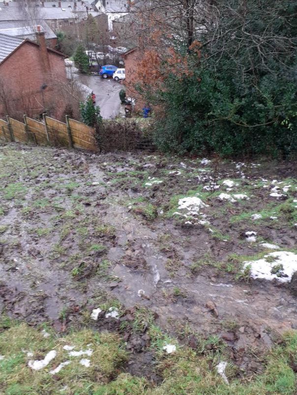 A fed up woman says her garden had flooded for the 16th time in less than a year