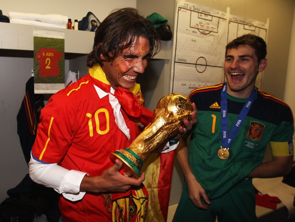 a man in a red shirt with the number 10 on it