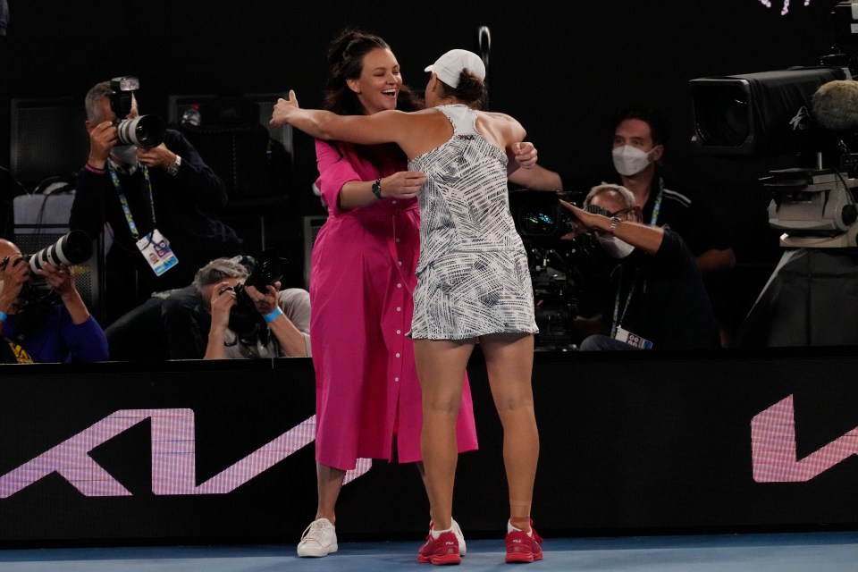 Barty hugged  Casey Dellacqua courtside after wrapping up victory