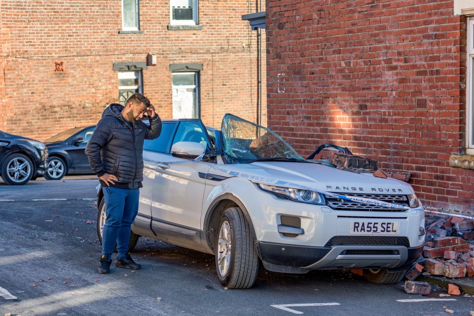 In South Shields, strong winds brought a wall crashing down on a dad-of-two's £25,000 Range Rover - with the debris missing him by seconds