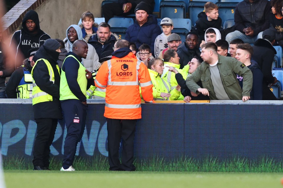 A furious Adebayo Akinfenwa confronted abusive MK Dons fans