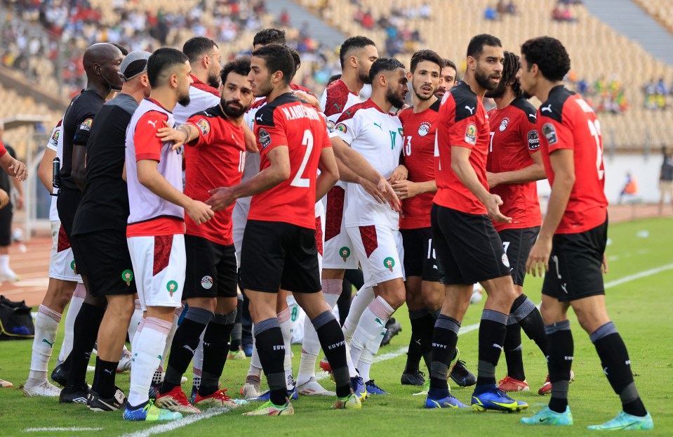 Both sets of players got involved with Mo Salah attempting to diffuse the situation