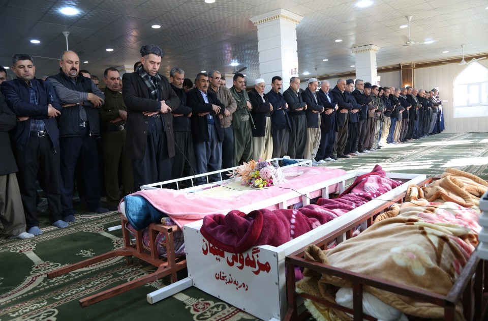 Rzgar and family members in Iraq mourn their lost loved ones