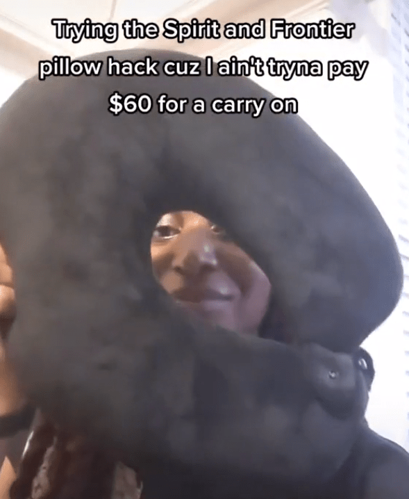 A woman shared a video on Tiktok revealing how she takes extra hand luggage on a plane – using a travel pillow