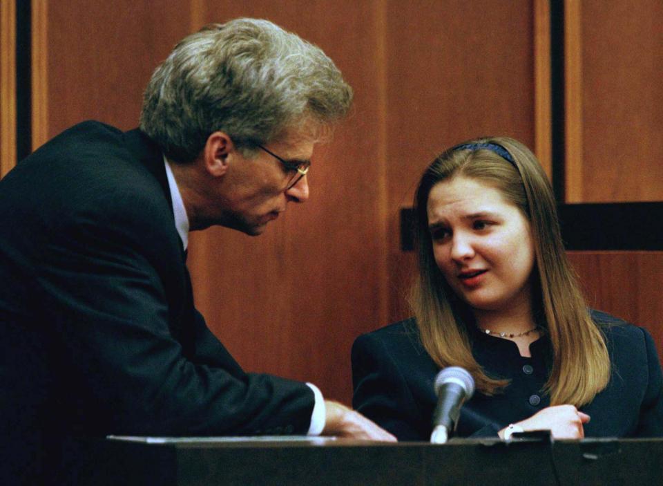 Louise Woodward speaking to her defence lawyer Andrew Good during her trial