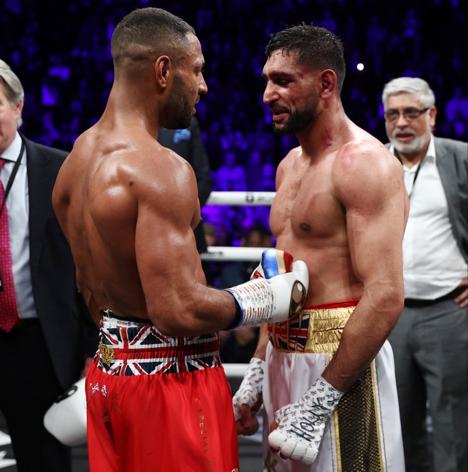 Kell Brook and Amir Khan embrace after their grudge match