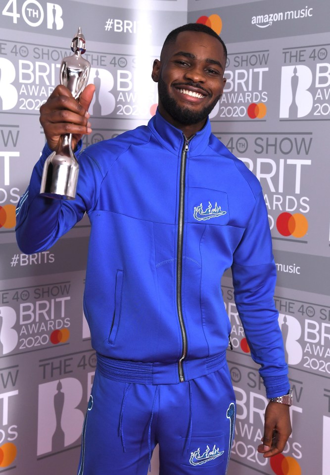 Rapper Dave, pictured with the Brit Award for Best British Album 2020, will also perform this year