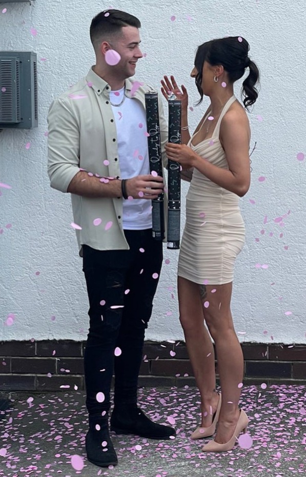 Chloe and Jake shared a snap of themselves surrounded by pink confetti