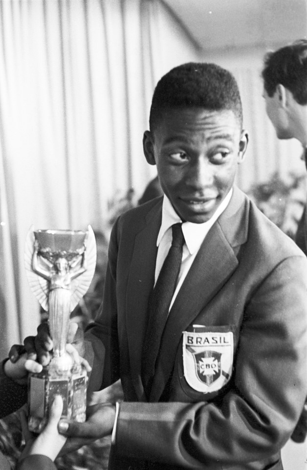 A 17-year-old Pele with the Jules Rimet trophy in 1958