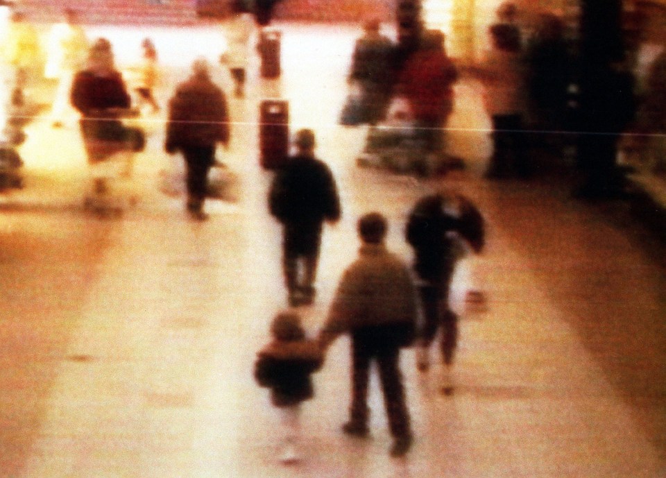 CCTV shows toddler James holding hands with his abductor and killer Venables at the Bootle Strand shopping mall on 12th February 1993