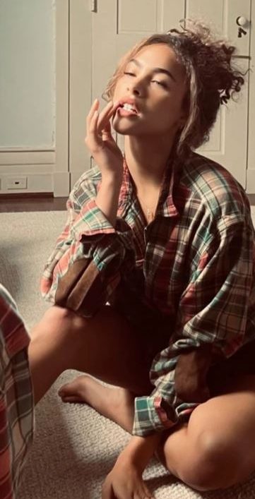  Camila was spotted wearing one of Lewis' plaid shirts in an Instagram snap