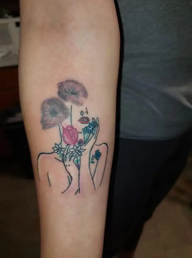 In another tattoo fail, people thought part of this woman's inking looked like two 'buttholes'