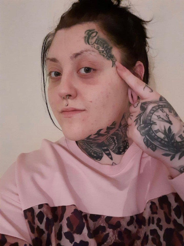 Factory worker Tanya Davies has tried to hide her facial ink with make-up, but her tattoo is too dark and still shines through