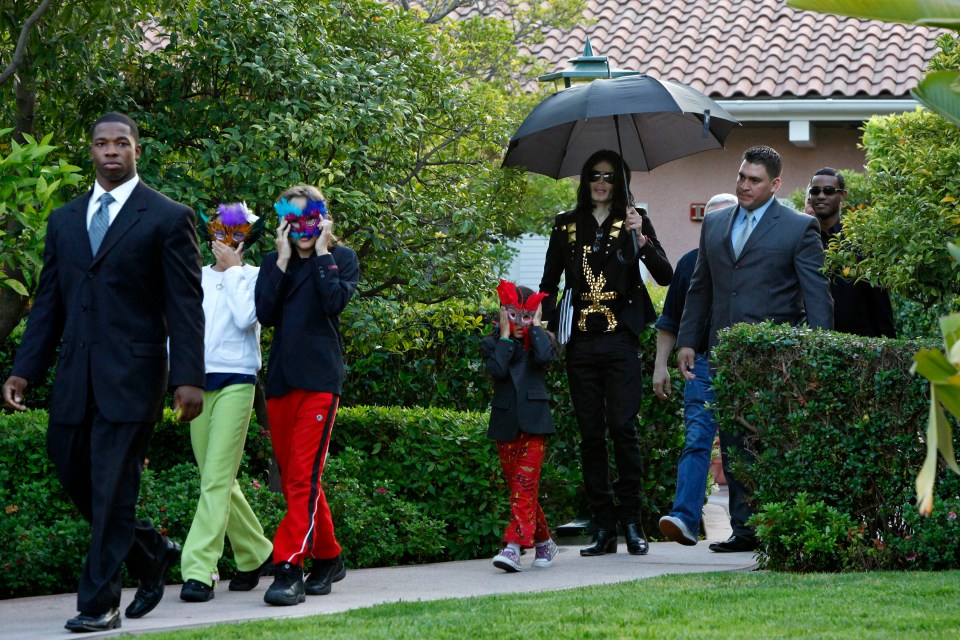 Michael's children hid their faces when their father was alive