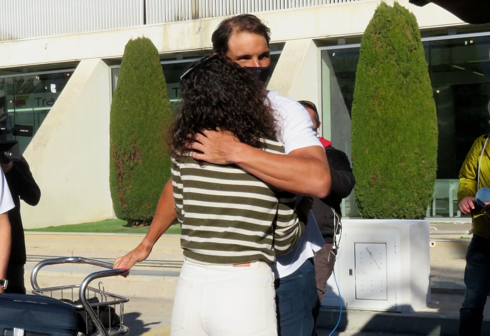 Rafa Nadal enjoyed a long-awaited hug with his wife Xisca upon touchdown in Mallorca