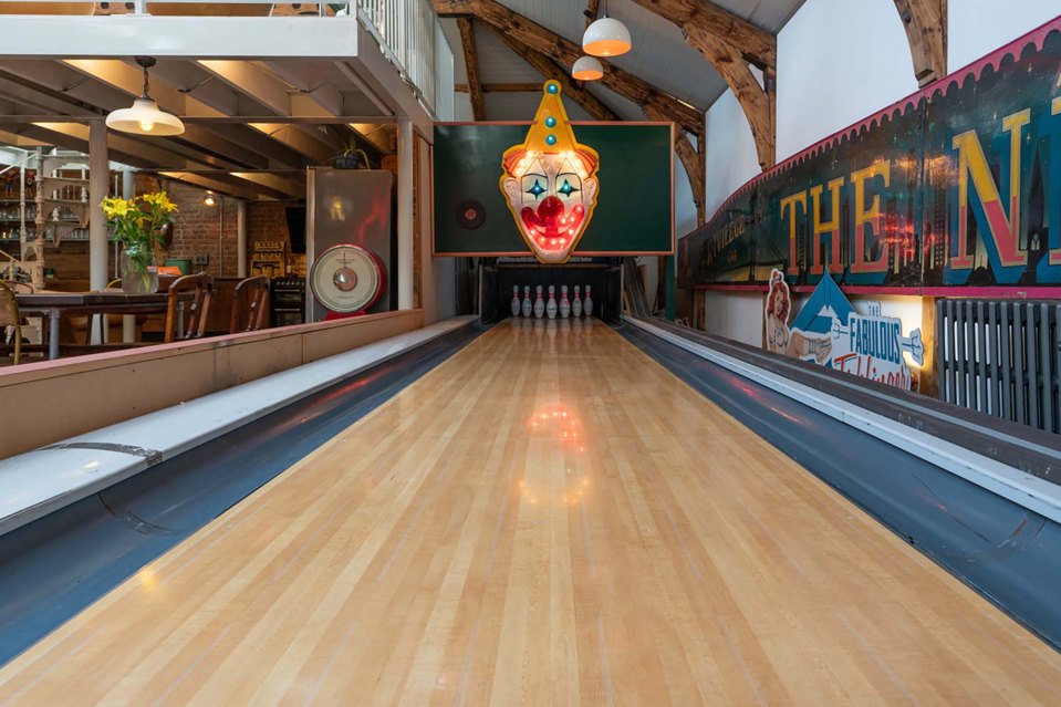 The mansion's pride and joy is its whopping big bowling alley