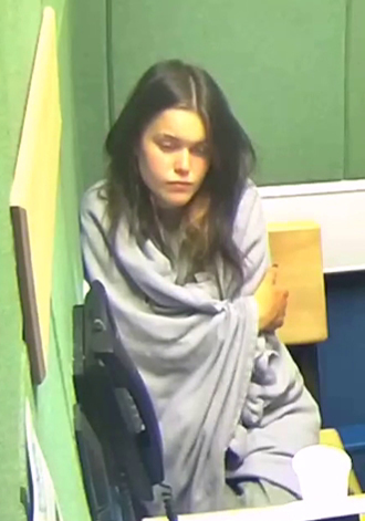 She wrapped herself in a blanket in a cynical bid to appear innocent to cops after she murdered a doctor