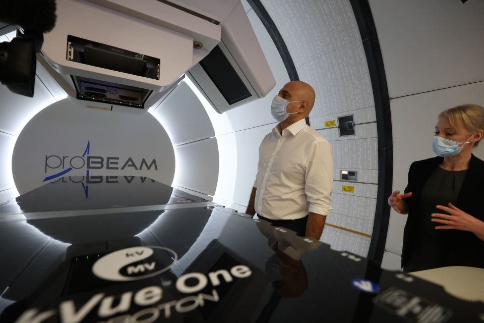 Sajid Javid viewing a proton beam scanner during a visit to University College Hospital in London