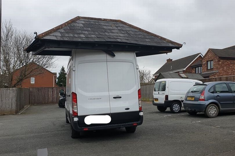 A driver accidentally took off the roof of a car park while driving a rental van