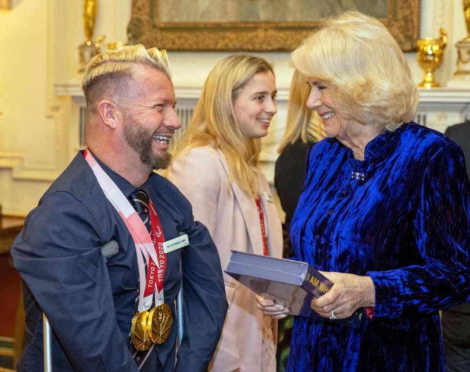 Equestrian Sir Lee Pearson presented Camilla with his book