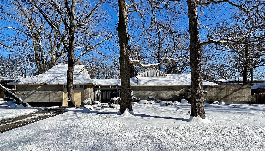 The concrete house has five bedrooms and five bathrooms