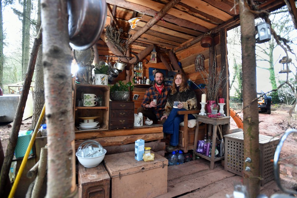 The 'rooms' in their home are a series of wooden huts