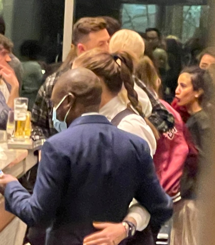 The couple had a peck at the bar