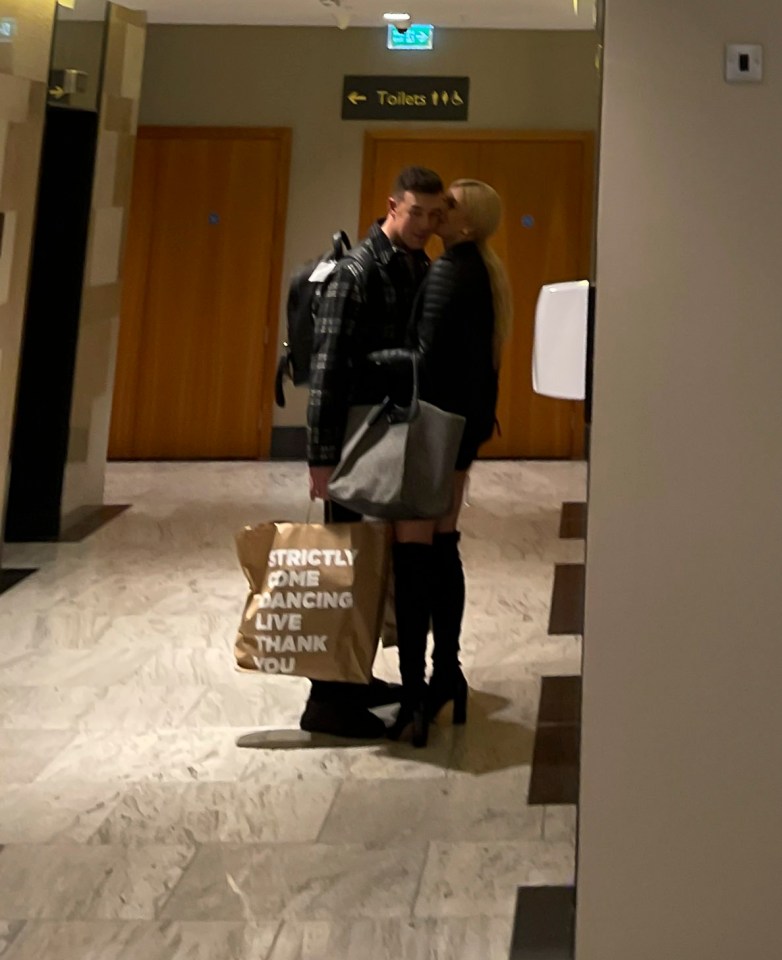 They shared a close moment by the lifts