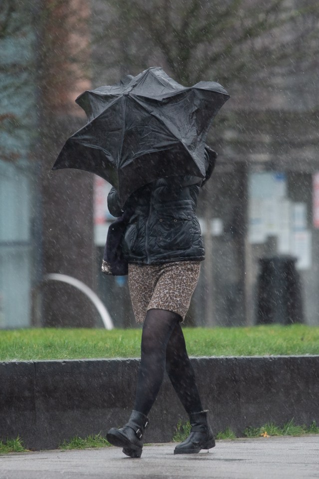 Rain pelted Mancunians