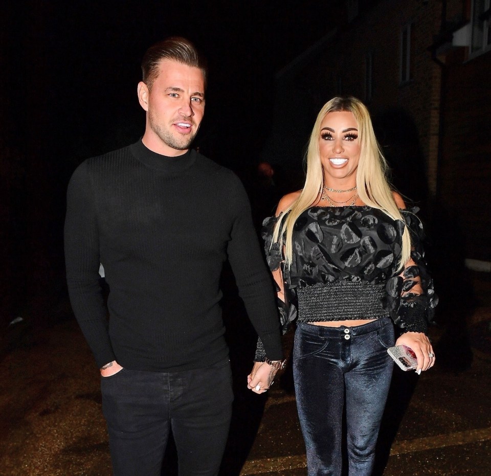 Katie Price's fiance Carl Woods has been charged, police said