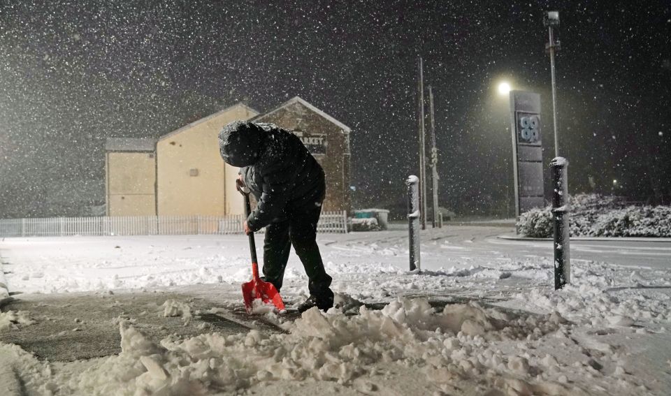 Snow being cleared in Tow Law, County Durham, as Storm Eunice sweeps across the UK