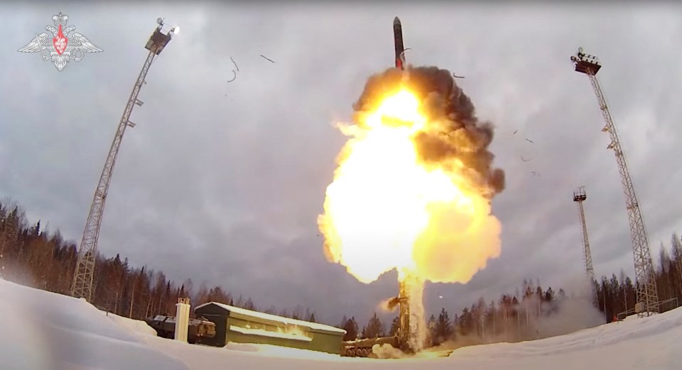 A Russian intercontinental missile is launched in a drill by Vladimir Putin's nuclear forces - as the threat level increases