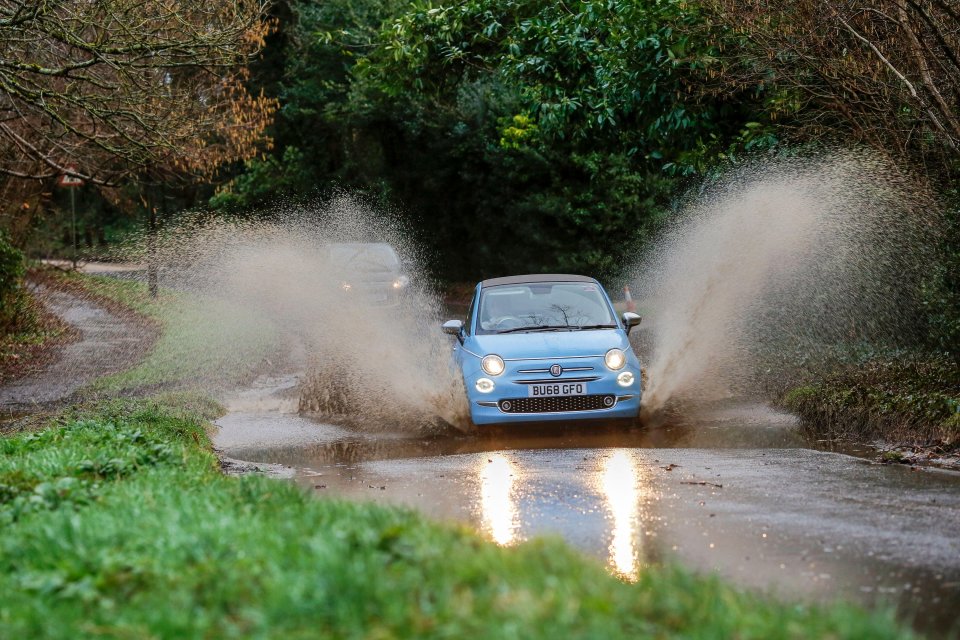 Roads were left underwater in Godalming, Surrey