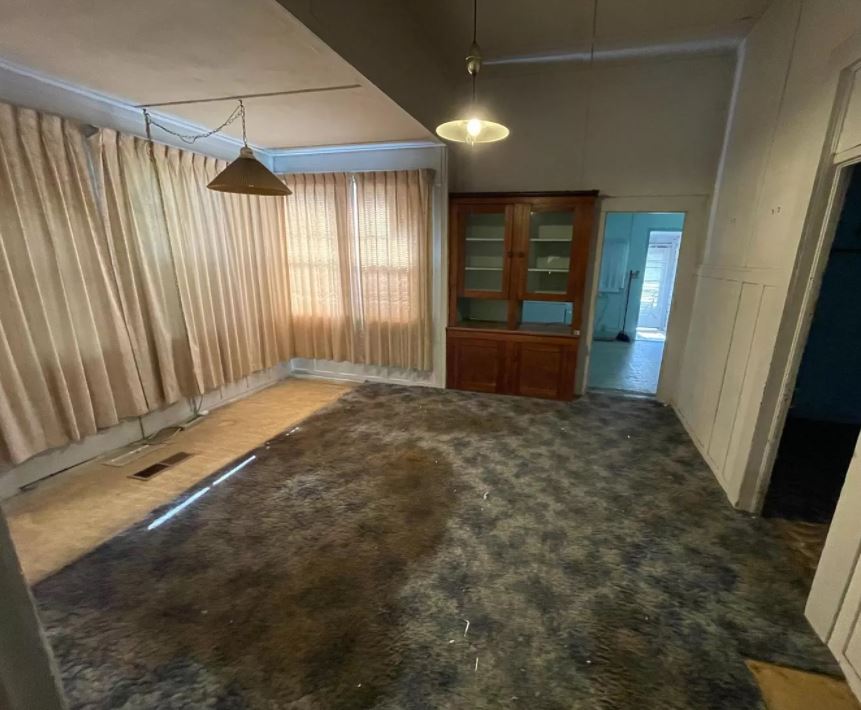 A large stain on the carpet was compared to a murder scene