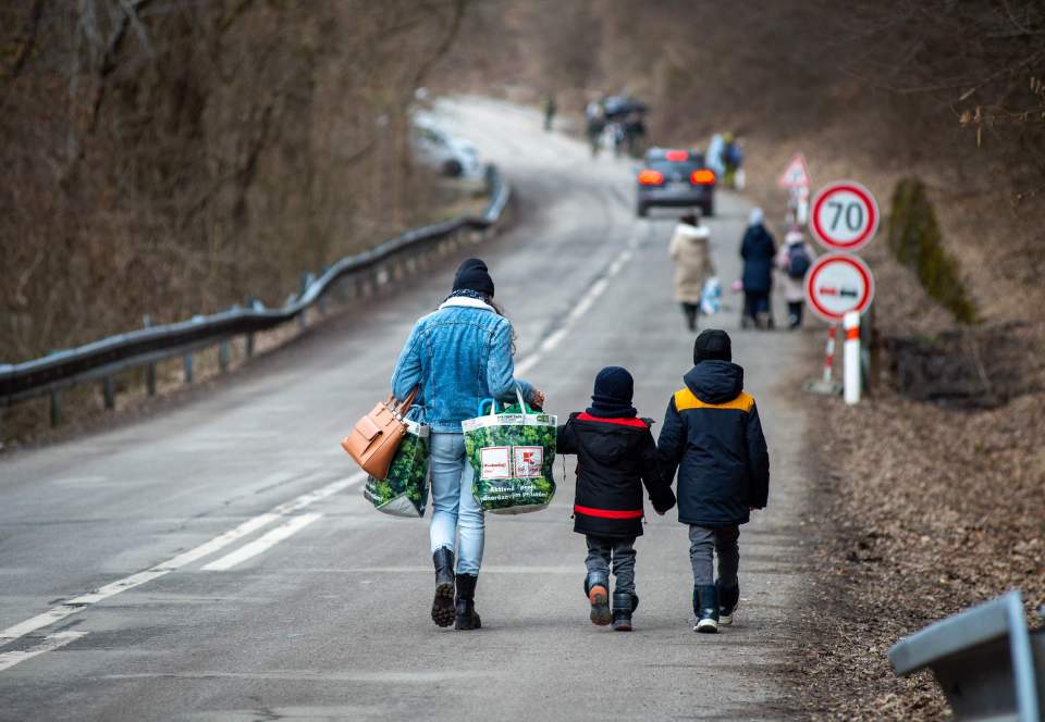 I felt like crying for the poor, terrified people of Ukraine - a woman with two children flees after the Russian invasion