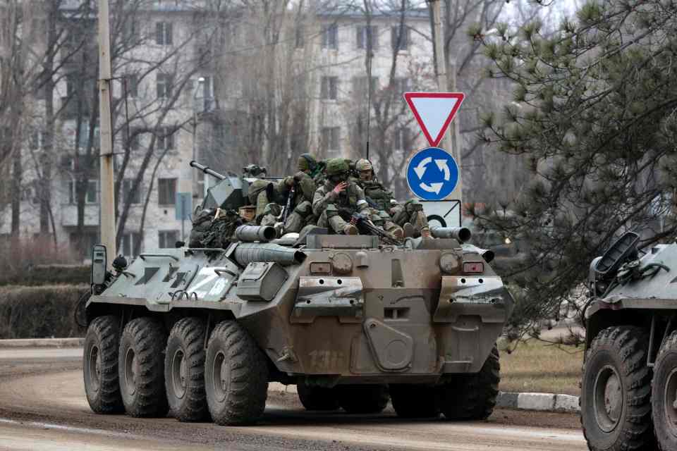 Russian troops on an armoured vehicle in Armyansk, Crimea