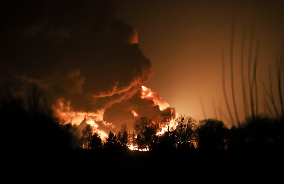 Smoke billows from an oil depot in Vasylkiv, around 25m west of Kyiv, after a Russian missile attack