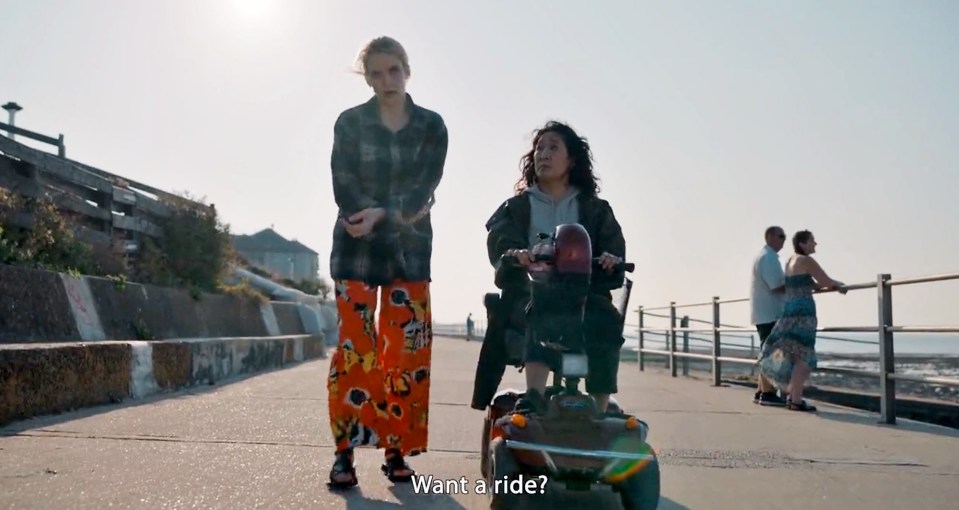 Eve pulls up alongside Villanelle on her scooter and asks her old adversary if she wants a ride