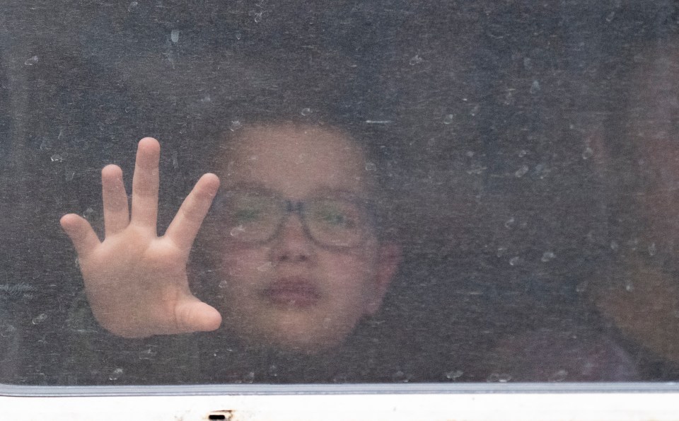 Georgi waves goodbye to his dad Ruslan at Lviv station