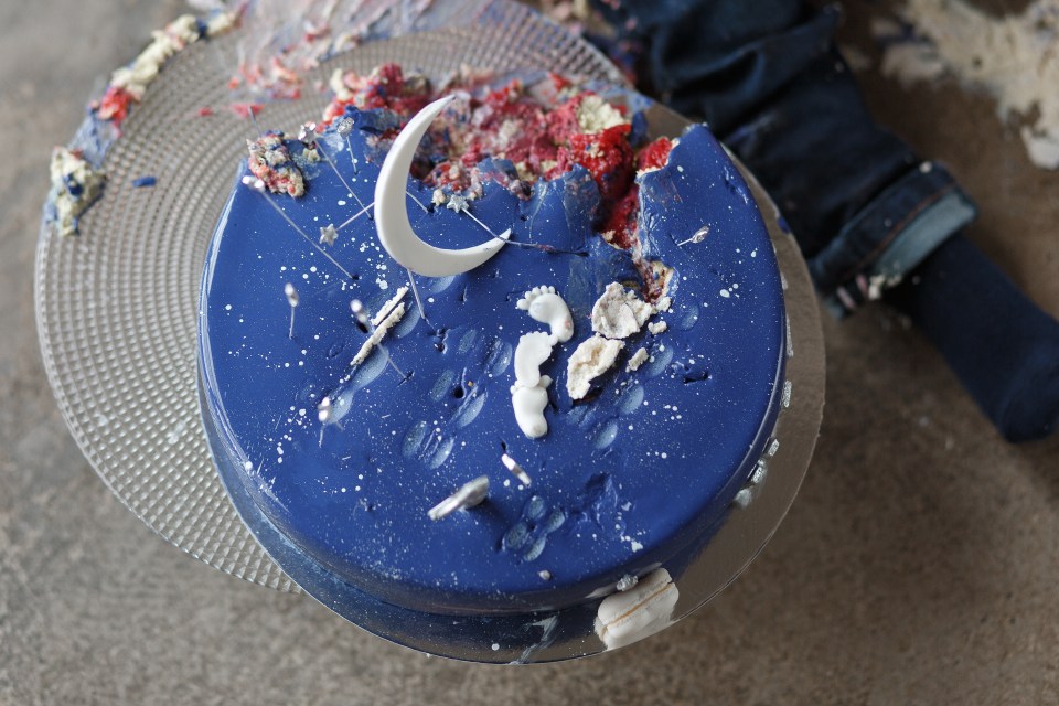 The woman claims her cousin should pay for her son's ruined birthday cake