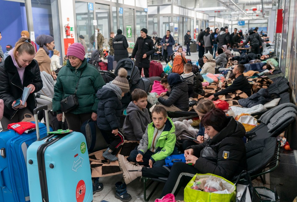 The mall mostly full of women and children is in Poland, less than a mile from Ukraine's border