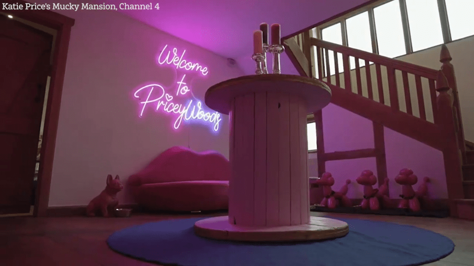 A neon sign is the centerpiece of Katie's new hallway