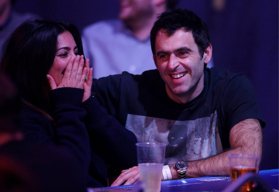 The pair watching on at the World Darts Championship in 2014