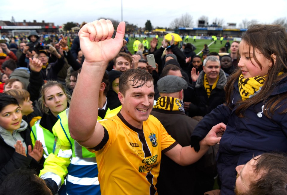 Sutton celebrate their famous win over Leeds