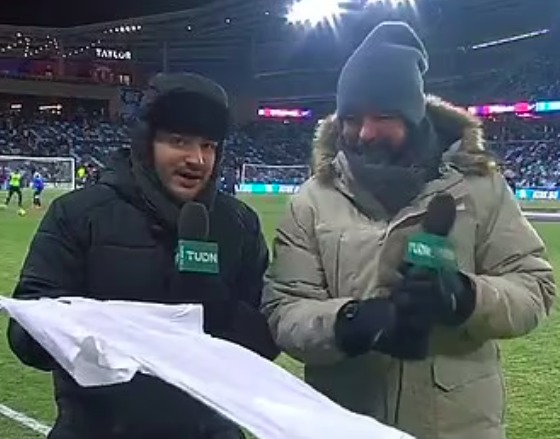 Pitchside TV reporters showed just how cold it was by unveiling a frozen shirt