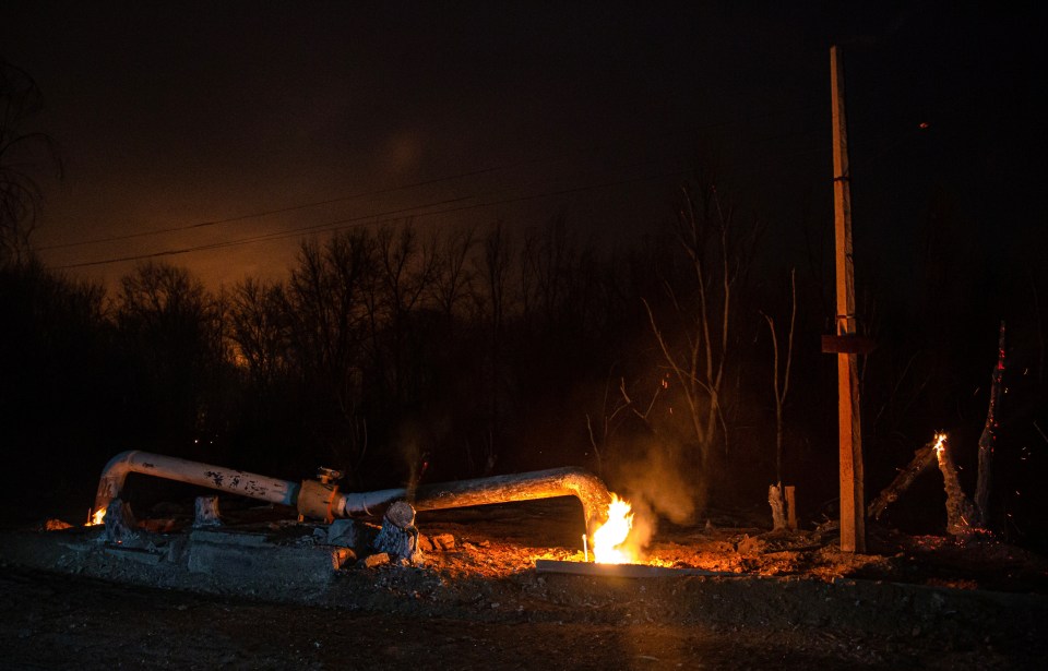 A gas pipeline continues to burn after being hit by a blast in Luhansk