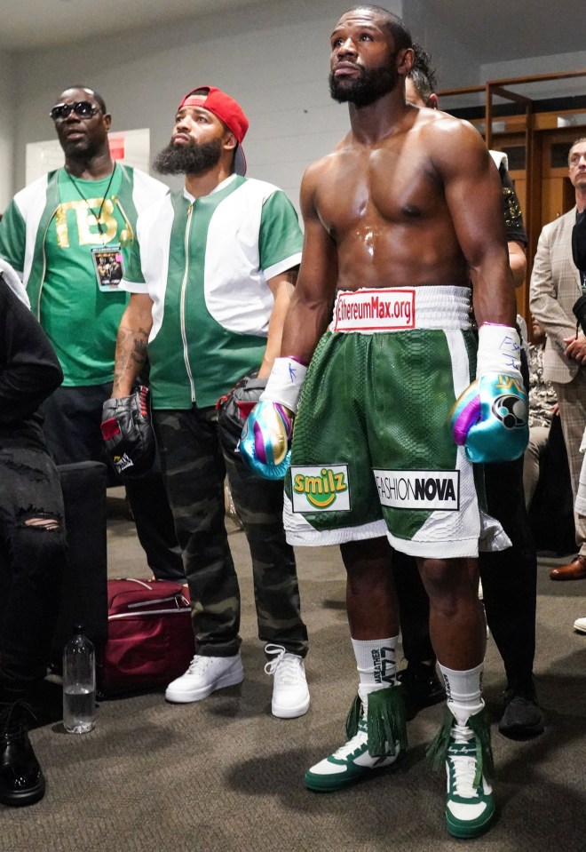 Gerald Tucker pictured next to Floyd Mayweather