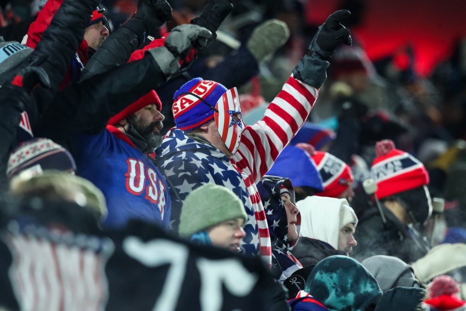 American fans wrapped up warm in the freezing temperatures