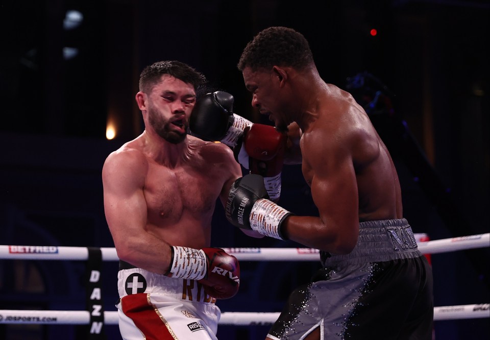 Daniel Jacobs lands a right hook on John Ryder