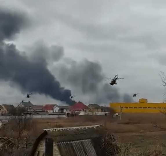 Smoke rose near Kyiv after Russian choppers flew over to attack an airport just miles from the capital